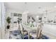 Bright dining room with chandelier and access to backyard at 3404 Grassy Lake View Ave, Minneola, FL 34715