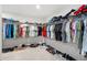 Large walk-in closet with ample shelving and hanging space at 3404 Grassy Lake View Ave, Minneola, FL 34715