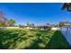 Spacious backyard with a large grassy area and trees at 3454 Country Walk Dr, Port Orange, FL 32129