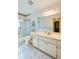 Bathroom with a double sink vanity and tile floors at 3454 Country Walk Dr, Port Orange, FL 32129