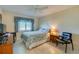 Cozy bedroom with a double bed and a ceiling fan at 3454 Country Walk Dr, Port Orange, FL 32129