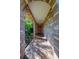 Brick covered entryway with arched walkway and terracotta tile flooring at 3454 Country Walk Dr, Port Orange, FL 32129