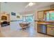Eat-in kitchen with stainless steel appliances and ample cabinet space at 3454 Country Walk Dr, Port Orange, FL 32129
