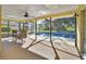 Screened-in pool area with outdoor dining set at 392 Glen Abbey Ln, Debary, FL 32713