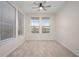 Bright bedroom with neutral walls and carpet flooring at 4859 Nw 35Th Lane Rd, Ocala, FL 34482