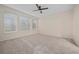 Spacious bedroom with neutral carpeting and large windows at 4859 Nw 35Th Lane Rd, Ocala, FL 34482