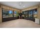 Enclosed patio with tile flooring and ceiling fan at 4859 Nw 35Th Lane Rd, Ocala, FL 34482