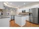 Spacious kitchen with stainless steel appliances and granite countertops at 4859 Nw 35Th Lane Rd, Ocala, FL 34482
