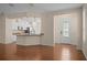 Modern kitchen with granite countertops and white cabinets at 4859 Nw 35Th Lane Rd, Ocala, FL 34482