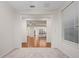 Open living room with hardwood floors and views to kitchen at 4859 Nw 35Th Lane Rd, Ocala, FL 34482