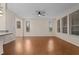 Bright living room with hardwood floors and large windows at 4859 Nw 35Th Lane Rd, Ocala, FL 34482