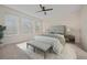 Spacious main bedroom with carpeted floor and large windows at 4859 Nw 35Th Lane Rd, Ocala, FL 34482