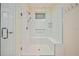 Walk-in shower with glass enclosure and built-in seat at 4859 Nw 35Th Lane Rd, Ocala, FL 34482