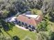 Bird's eye view of home with pool and lush landscaping at 544 Stone Island Rd, Enterprise, FL 32725