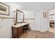 Bathroom with dark wood vanity and storage at 1 John Anderson Dr # 2180, Ormond Beach, FL 32176