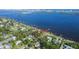 Aerial view of waterfront lot with surrounding houses at 101 Fleming Ave, Port Orange, FL 32127