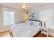 Bright and airy guest bedroom with hardwood floors at 101 Fleming Ave, Port Orange, FL 32127