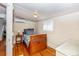 Small bedroom with wood floors and twin bed at 101 Fleming Ave, Port Orange, FL 32127
