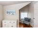 Cozy bedroom with window seat and white dresser at 101 Fleming Ave, Port Orange, FL 32127