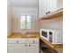 Kitchen nook with microwave and wood countertop at 101 Fleming Ave, Port Orange, FL 32127