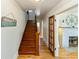Elegant hardwood staircase leading to upper level at 101 Fleming Ave, Port Orange, FL 32127