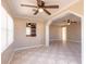 Bright dining area with tile floors and ceiling fan at 122 Sunrise Blvd, Daytona Beach, FL 32118