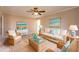 Virtually staged living room with coastal decor at 122 Sunrise Blvd, Daytona Beach, FL 32118