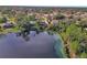 Aerial view of lakefront home with dock at 1250 Baton Dr, Deltona, FL 32725