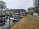 Covered boat dock on a canal at 1632 Bream Dr, Seville, FL 32190