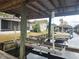 Covered boat dock with lift at 1632 Bream Dr, Seville, FL 32190