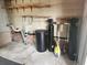 Utility room with water heater and filtration system at 1632 Bream Dr, Seville, FL 32190