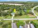 Aerial view showing house location, driveway, and surrounding landscape at 2 Walnut Ct, Ormond Beach, FL 32174