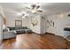 Spacious basement with hardwood floors and sectional sofa at 2 Walnut Ct, Ormond Beach, FL 32174