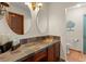 Double vanity bathroom with copper vessel sinks and slate tile at 2 Walnut Ct, Ormond Beach, FL 32174