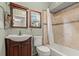 Clean bathroom with a bathtub and tiled walls at 2 Walnut Ct, Ormond Beach, FL 32174