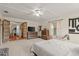 Main bedroom with window and access to other rooms at 2 Walnut Ct, Ormond Beach, FL 32174