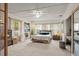Bright bedroom with a comfy bed and stylish decor at 2 Walnut Ct, Ormond Beach, FL 32174