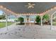 Covered carport with a metal roof and string lights at 2 Walnut Ct, Ormond Beach, FL 32174