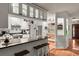 Eat-in kitchen features a breakfast bar and ample cabinet space at 2 Walnut Ct, Ormond Beach, FL 32174
