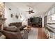 Spacious living room with fireplace and large TV at 2 Walnut Ct, Ormond Beach, FL 32174