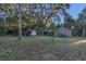 Spacious backyard with shed and lush landscaping at 2039 Riverview Dr, Deland, FL 32720