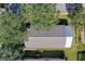 Property overview showcasing the home's roofline and landscaping at 22 Old Macon Dr, Ormond Beach, FL 32174