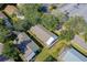 Aerial view showcasing home's location in a quiet neighborhood with lush landscaping at 22 Old Macon Dr, Ormond Beach, FL 32174