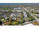 Aerial view showing home's location near shopping centers and main roads at 22 Old Macon Dr, Ormond Beach, FL 32174