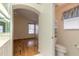 Small bathroom with toilet and linen cabinet at 22 Old Macon Dr, Ormond Beach, FL 32174