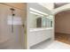 Bathroom with shower, double vanity and view of bedroom at 22 Old Macon Dr, Ormond Beach, FL 32174