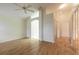 Large bedroom with hardwood floors and access to bathroom at 22 Old Macon Dr, Ormond Beach, FL 32174