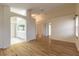 Main bedroom with hardwood floors and ensuite bathroom at 22 Old Macon Dr, Ormond Beach, FL 32174