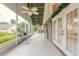 Relaxing screened patio, with tile floors and outdoor seating at 22 Old Macon Dr, Ormond Beach, FL 32174