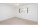 Spacious bedroom with ceiling fan and window at 225 N Hill Ave # 60, Deland, FL 32724